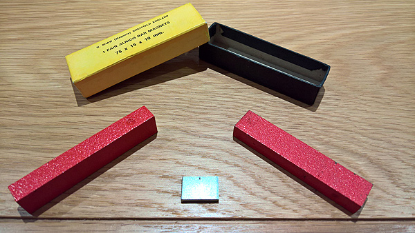 Two Alinco bar magnets supplied with the Helmholtz coil for experimentation